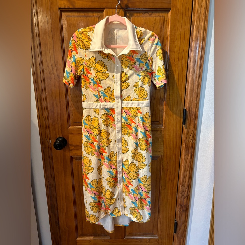 Authentic vintage dress from the late 60s or early 70s. Puma print. Size S